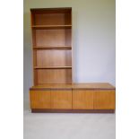 A mid century G Plan teak modular wall system / shelving system, consisting of a base unit and