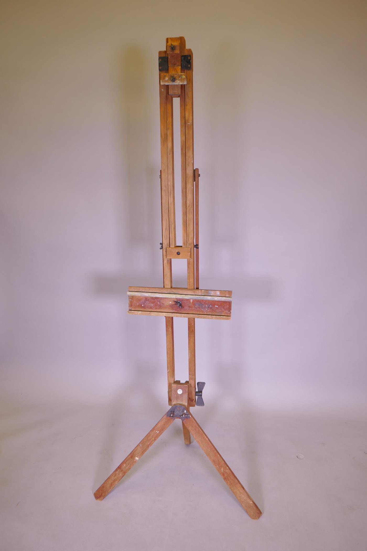 A Windsor and Newton folding artist's easel, 194cm high