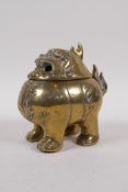 A Chinese bronze censer in the form of a kylin, 12cm long