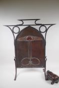 An Art Nouveau Liberty style copper and wrought iron fire screen, AF lacks one foot, 64cm x 72cm
