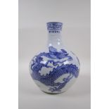 A blue and white porcelain vase decorated with a dragon in flight, Chinese Xuande 6 character mark
