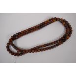 A string of horn prayer beads, 150cm long