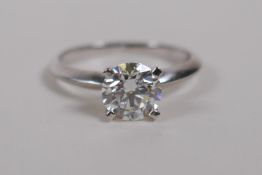 An 18ct white gold diamond solitaire ring, 1.01ct, F/VS2, size M