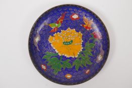 A Chinese cloisonne dish with bird and flower decoration, engraved bat and auspicious symbol