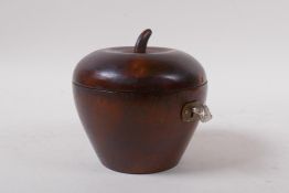 A treen apple shaped tea caddy, 11cm high