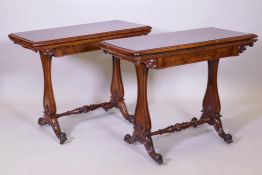 A pair of early C19th burr walnut card tables, each with a fold over top and single frieze drawer,