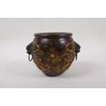 A Chinese bronze censer with two lion mask handles, and raised gilt dragon decoration, 4 character