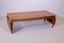 A Frances & Daverkossen Danish teak coffee table, with drop ends labelled to base, c.1950,