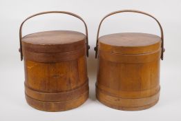 A pair of antique coopered wooden buckets and covers, 25cm high x 26cm diameter