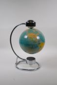 A magnetic levitating terrestrial globe, lacks power lead, 38cm high
