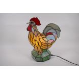 A Tiffany style table lamp in the form of a cockerel, 35cm high