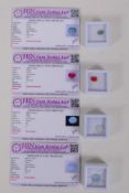 Four gemstones with associated JBN Gem Testing Lab gemological test certificates, including