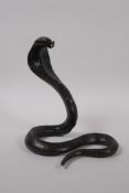 A filled bronze figure of a cobra, 18cm high