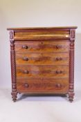 A Victorian figured mahogany Scotch chest with moulded top  drawer over four flanked by twisted