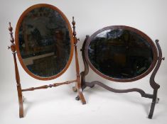 An Edwardian inlaid mahogany oval plate swing toilet mirror on easel frame, 64cm high (cross brace