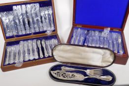 Two C19th mahogany canteen boxes containing three sets of six hallmarked silver fish knives and