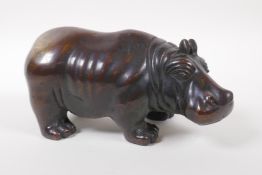 A Chinese filled bronze hippo, 21cm long