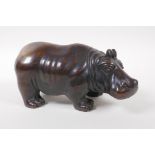 A Chinese filled bronze hippo, 21cm long