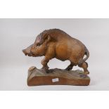 A black forest style carved wood figure of a wild boar, 35cm high