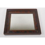 An antique mirror, the frame with inset tortoise shell panels, 38cm x 43cm