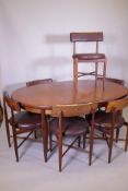 A G-Plan Fresco teak extending table, AF, and six leatherette dining chairs ensuite