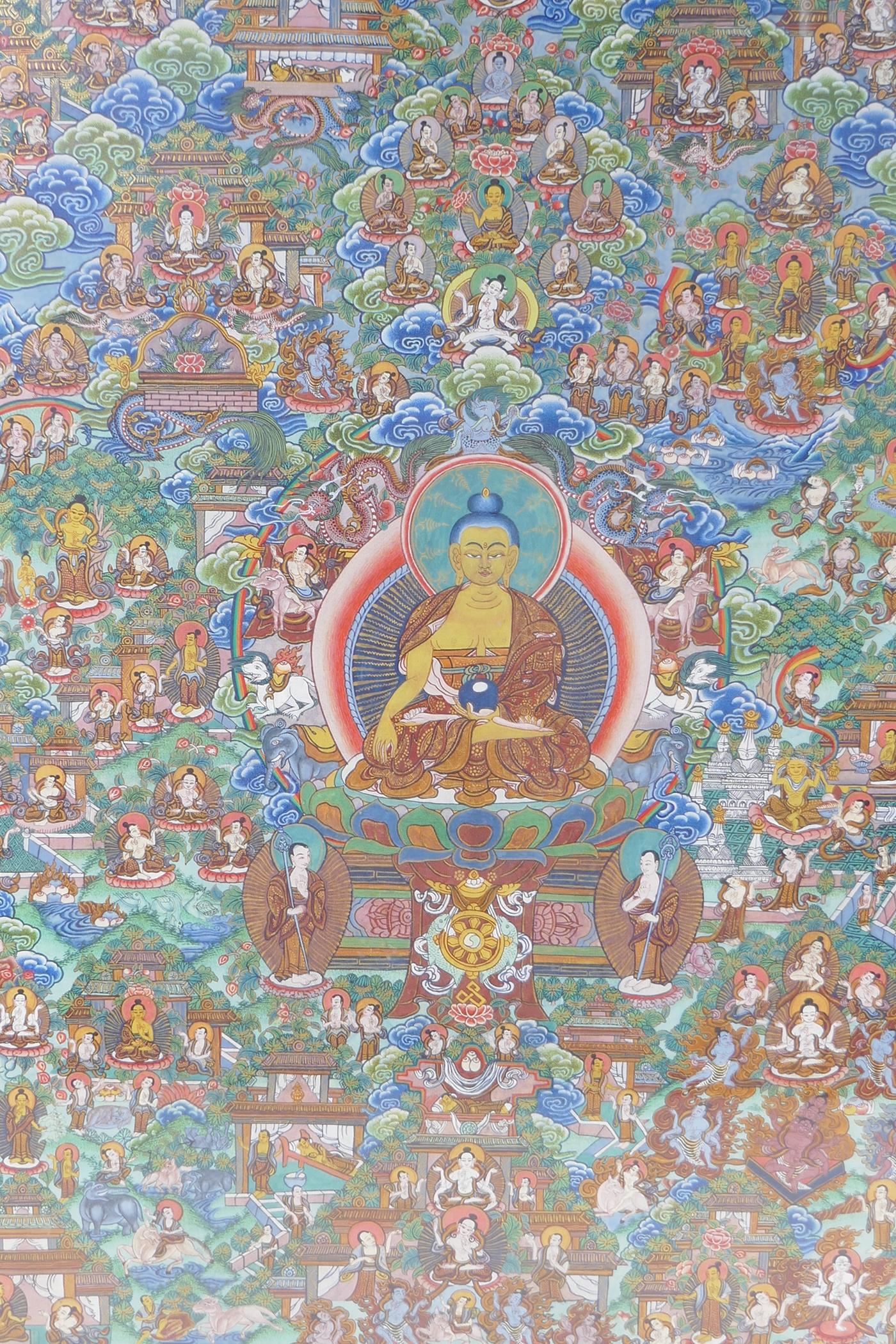 An eastern hand painted thanka with gilt highlights detailing many figures, 35cm x 49cm