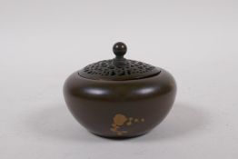 A Chinese gilt splash bronze censer and cover, impressed seal mark to base 7.5cm diameter