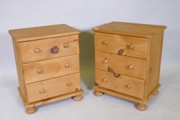 A pair of pine three drawer  bedside chests, 51 x 38cms, 62cm high