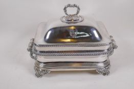 A silver plated four piece centre dish with cast handles and feet and applied gadrooned