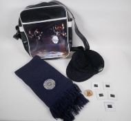 A collection of Beatles memorabilia, to include an Apple Corps corduroy cap and scarf, five