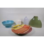 A collection of decorative pottery to include a Habitat vase and charger, a Wedgwood bowl and
