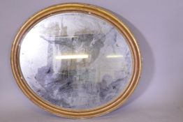 A gilt framed oval wall mirror, 89cm x 78cm