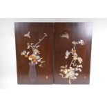 Two Japanese hardwood panels, inset with mother of pearl and carved bone decoration, both signed,