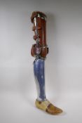 An early C20th French leather and metal prosthetic leg by Leridon of Paris, 76cm