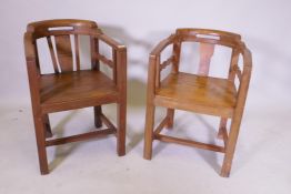 A pair of Chinese fruitwood open armchairs, 77cm high