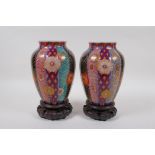 A pair of Japanese Meiji period ovoid Imari porcelain vases by Fukagawa Koransha, with ribbed body