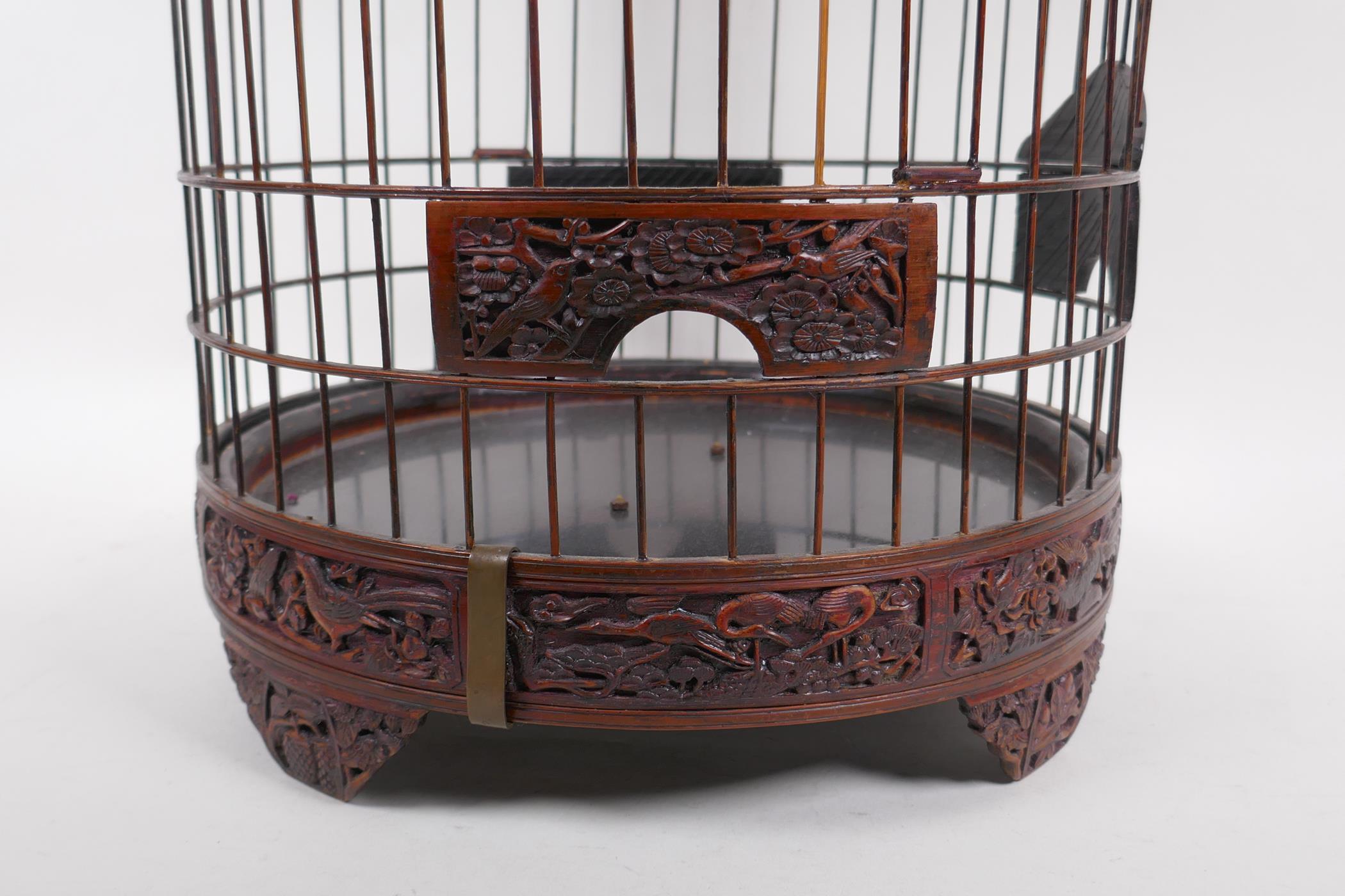 A Chinese bird cage with carved decorative frieze depicting birds and squirrels amongst foliage, - Image 2 of 4