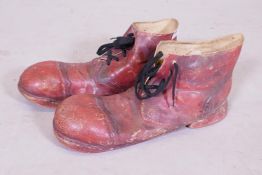 A pair of clown's rubber overshoes, 34cm long