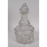 A lead crystal mallet decanter with cut and etched decoration of figures on horseback, stopper AF,