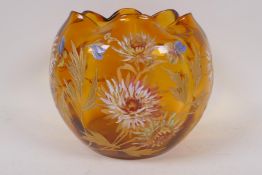A Mont Joye amber glass bowl, hand painted with flowers in bright enamels, 17cm high