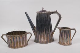 A Victorian silver plated three piece coffee set by Elkington & Co, circa 1866, 24cm high