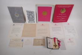 An O.B.E. presented to Harry Bowley, with all accompanying documents and booklets, for his work as