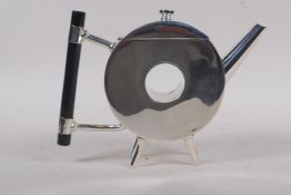 A silver plated teapot in the style of Christopher Dresser, 15cm high