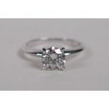 An 18ct white gold diamond solitaire ring, 1.01ct, F/VS2, size N