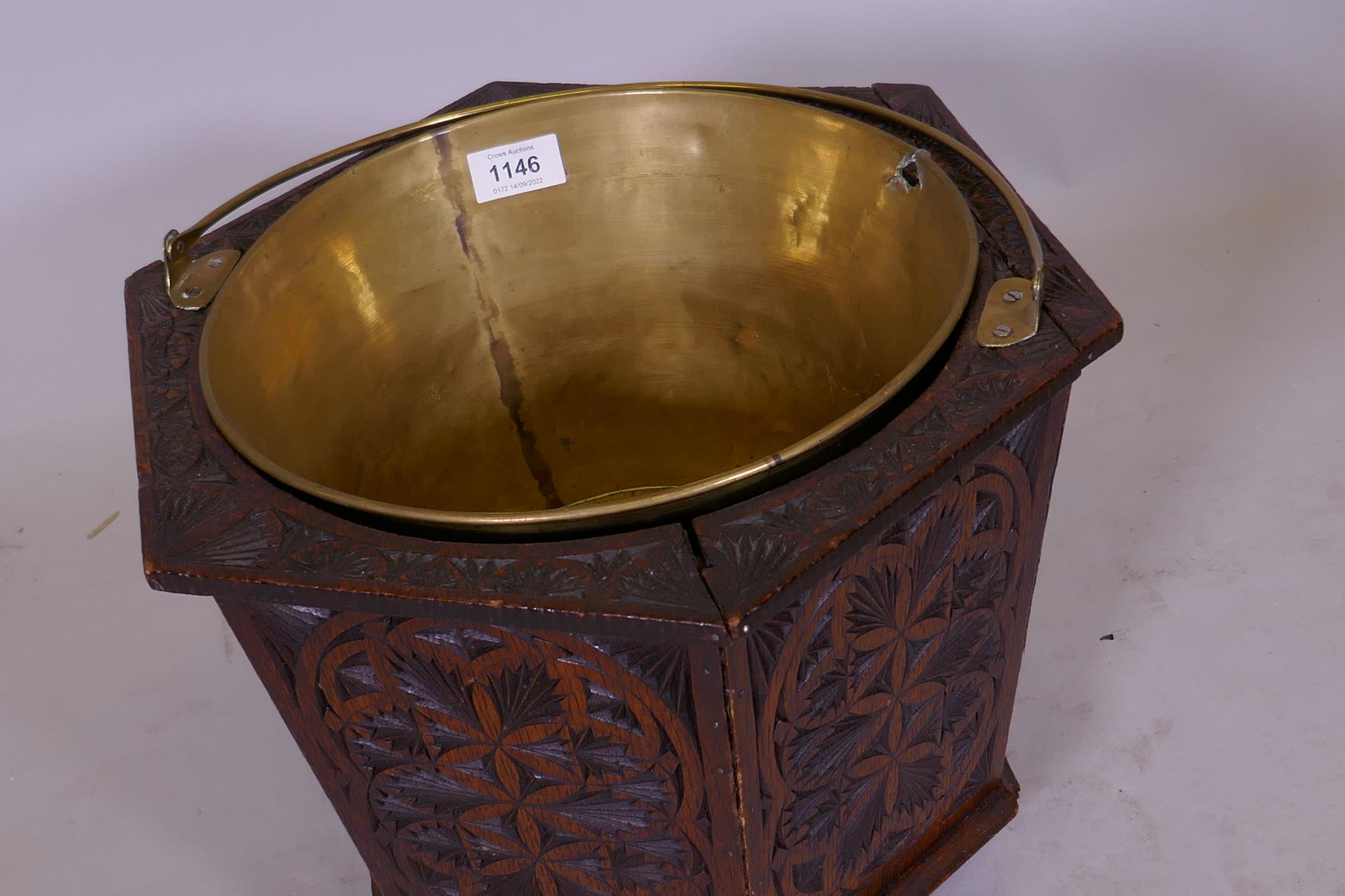 A C19th Dutch carved oak wine cooler with brass liner, 34cm diameter x 30cm - Image 2 of 2