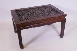 A Chinese hardwood coffee table with lattice top, 80cm x 54cm, 46cm high