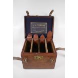 A Victorian leather four section cartridge case by C.B. Vaughn, 39 Strand, London, WC2, 33cm x 26cm,