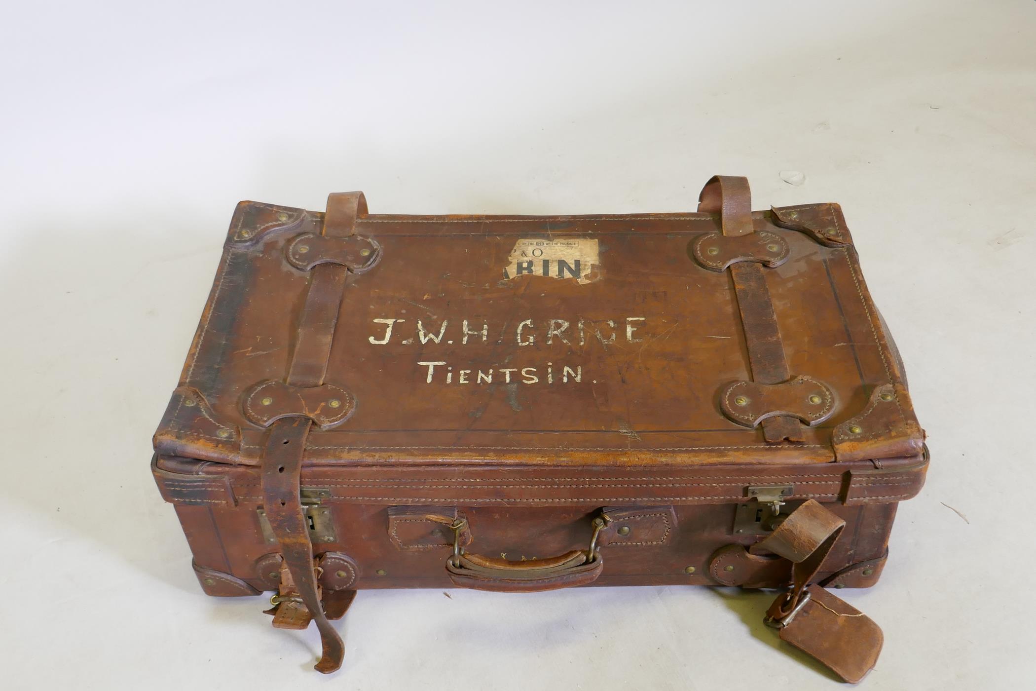 A vintage brown leather suitcase with brass catches and locks, for restoration, 78cm wide - Image 2 of 3