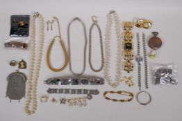 A quantity of assorted gilt and white metal vintage costume jewellery