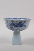 A Chinese blue and white porcelain stem cup with dragon decoration and ribbed stem, 9cm high x